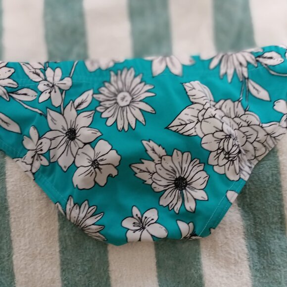 NEPTUNE DESIGNER SWIMBRIEF, SIZE SMALL, WHITE FLOWERS ON TEAL (Pre-Owned) - Picture 2 of 10